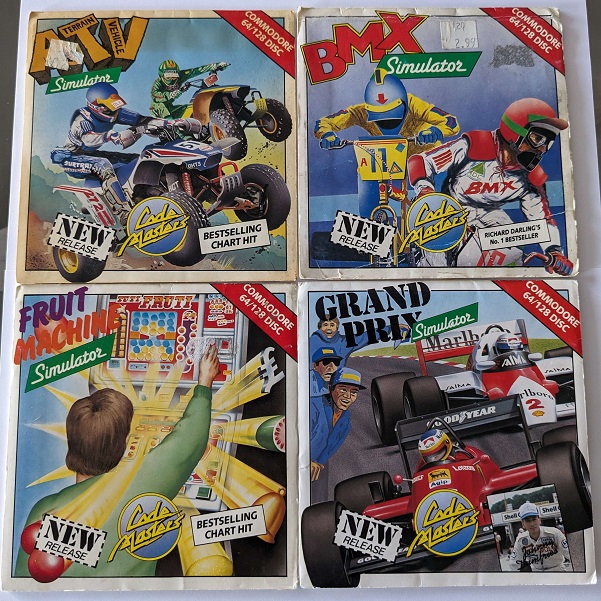 Codemasters Commodore 64 disk games.  From the top left: ATV Simulator, BMX Simulator, Fruit Machine Simulator and Grand Prix Simulator