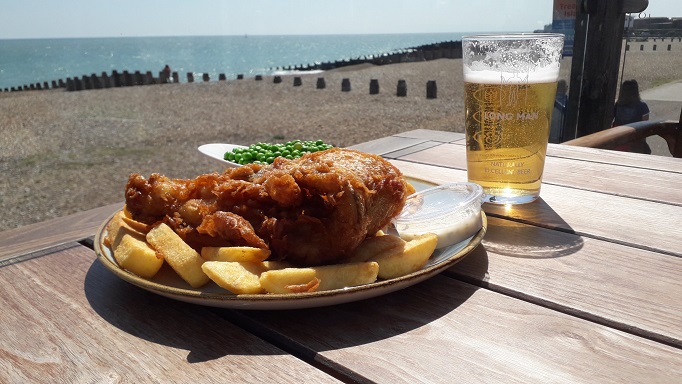 fish, chips and peas with a pint of Long Man Blonde at the Beach Deck, Eastbourne